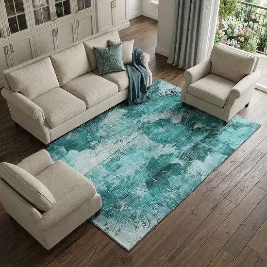 Teal And Ivory Floral Washable Area Rug With UV Protection Photo 1