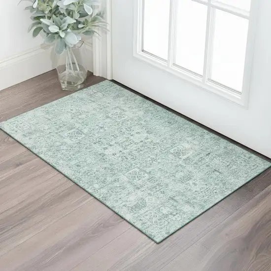 Teal And Ivory Floral Washable Area Rug With UV Protection Photo 1