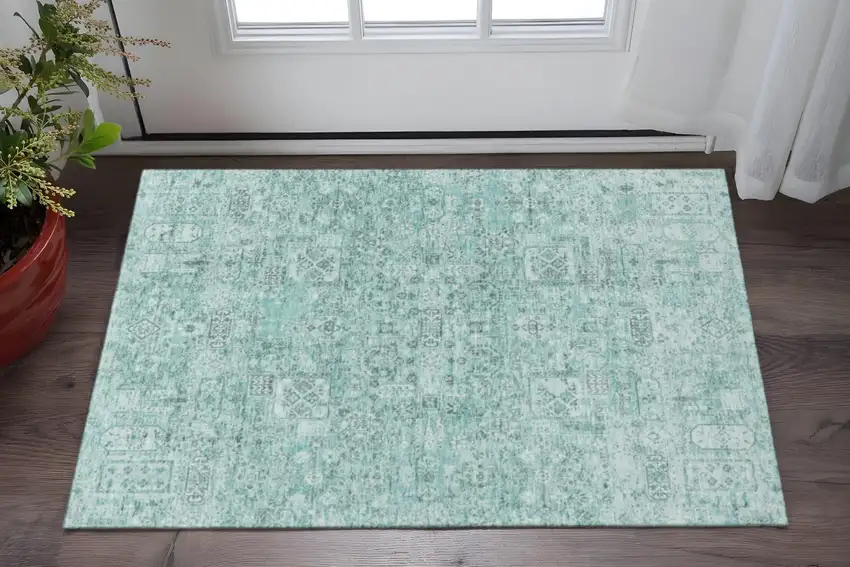 Teal And Ivory Floral Washable Area Rug With UV Protection Photo 2