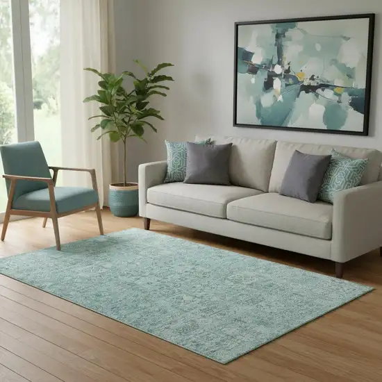 Teal And Ivory Floral Washable Area Rug With UV Protection Photo 1