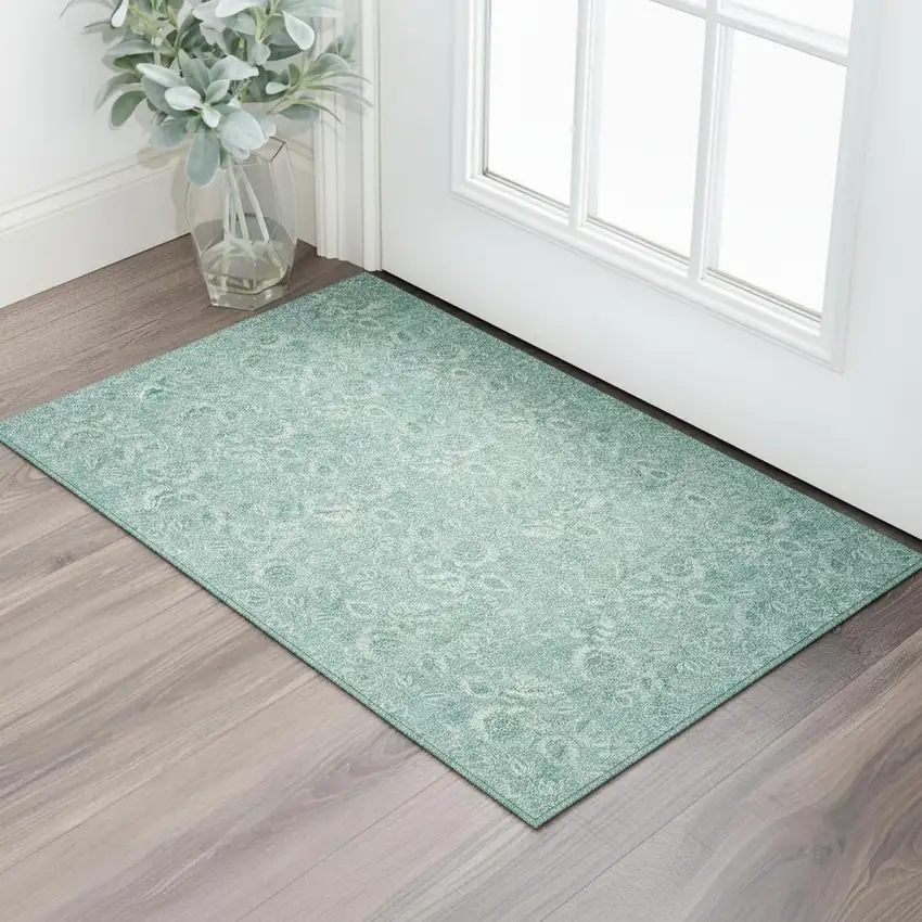 Teal And Ivory Floral Washable Area Rug With UV Protection Photo 1