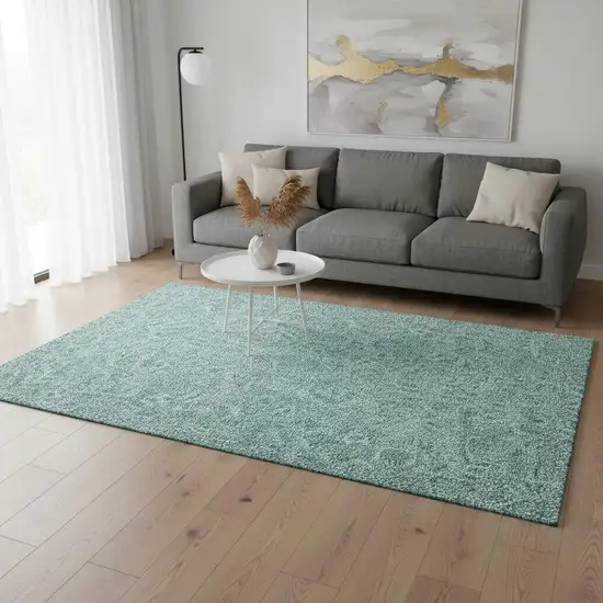 Teal And Ivory Floral Washable Area Rug With UV Protection Photo 1