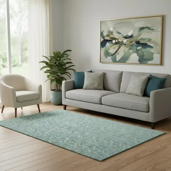 Teal And Ivory Floral Washable Area Rug With UV Protection Photo 1