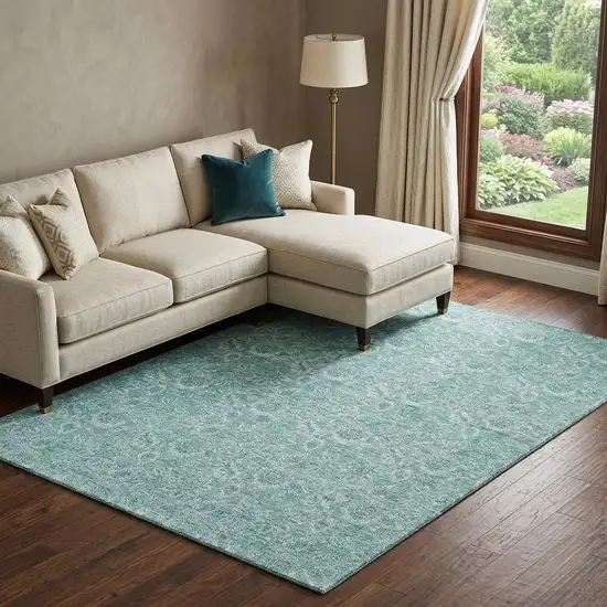 Teal And Ivory Floral Washable Area Rug With UV Protection Photo 1