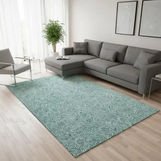 Teal And Ivory Floral Washable Area Rug With UV Protection Photo 1