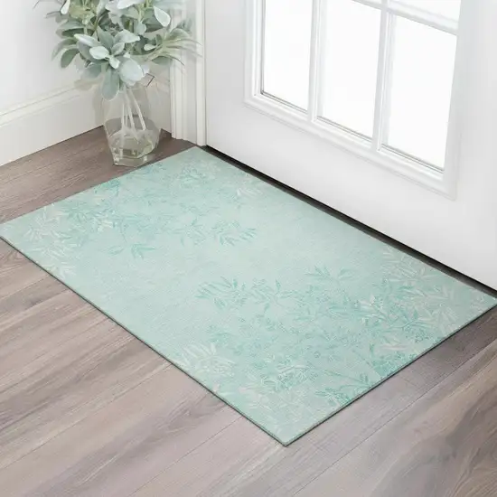 Teal And Ivory Floral Washable Area Rug With UV Protection Photo 1