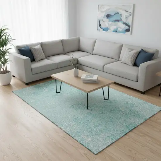 Teal And Ivory Floral Washable Area Rug With UV Protection Photo 1