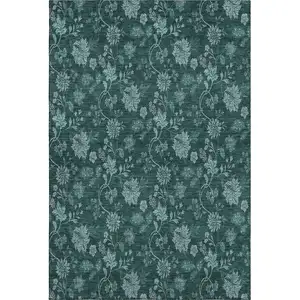 Photo of Teal And Ivory Floral Washable Area Rug With UV Protection