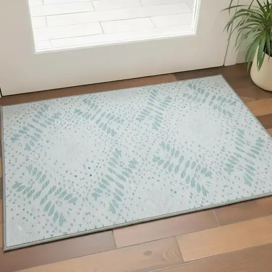 Teal And Ivory Floral Washable Area Rug With UV Protection Photo 2