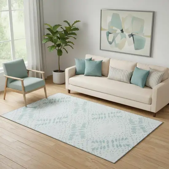 Teal And Ivory Floral Washable Area Rug With UV Protection Photo 1