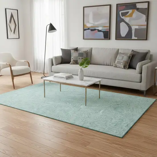 Teal And Ivory Floral Washable Area Rug With UV Protection Photo 2