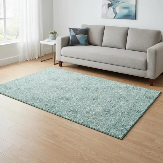 Teal And Ivory Floral Washable Area Rug With UV Protection Photo 2