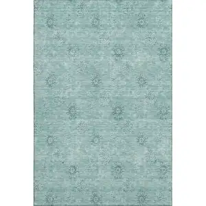 Photo of Teal And Ivory Floral Washable Area Rug With UV Protection