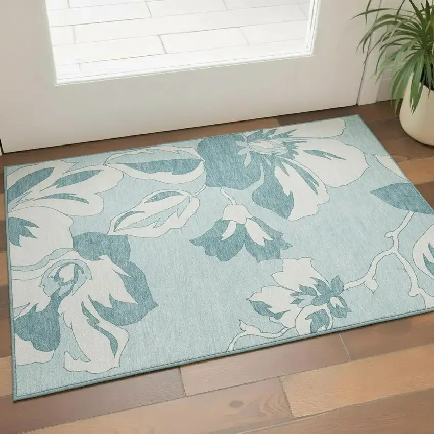 Teal And Ivory Floral Washable Area Rug With UV Protection Photo 1