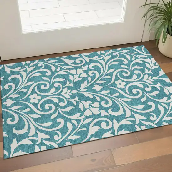 Teal And Ivory Floral Washable Area Rug With UV Protection Photo 1