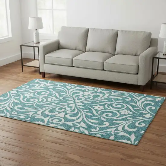 Teal And Ivory Floral Washable Area Rug With UV Protection Photo 2