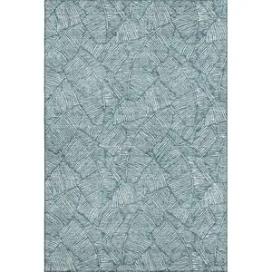 Photo of Teal And Ivory Floral Washable Area Rug With UV Protection