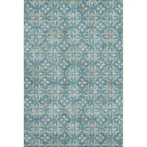 Photo of Teal And Ivory Floral Washable Area Rug With UV Protection