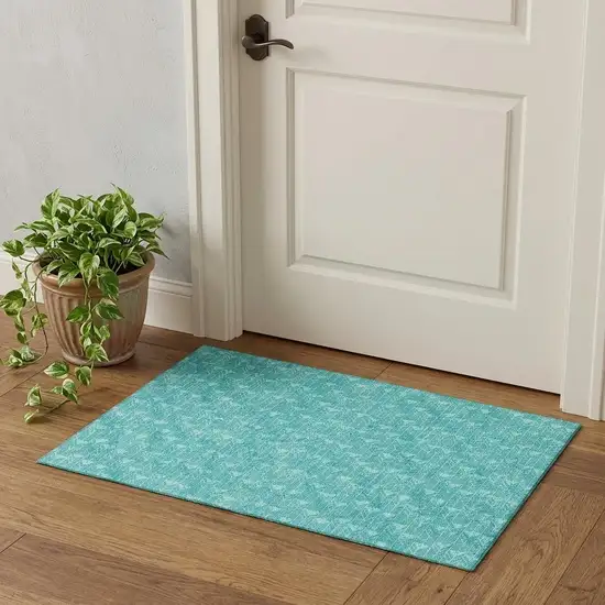 Teal And Ivory Geometric Washable Area Rug With UV Protection Photo 1