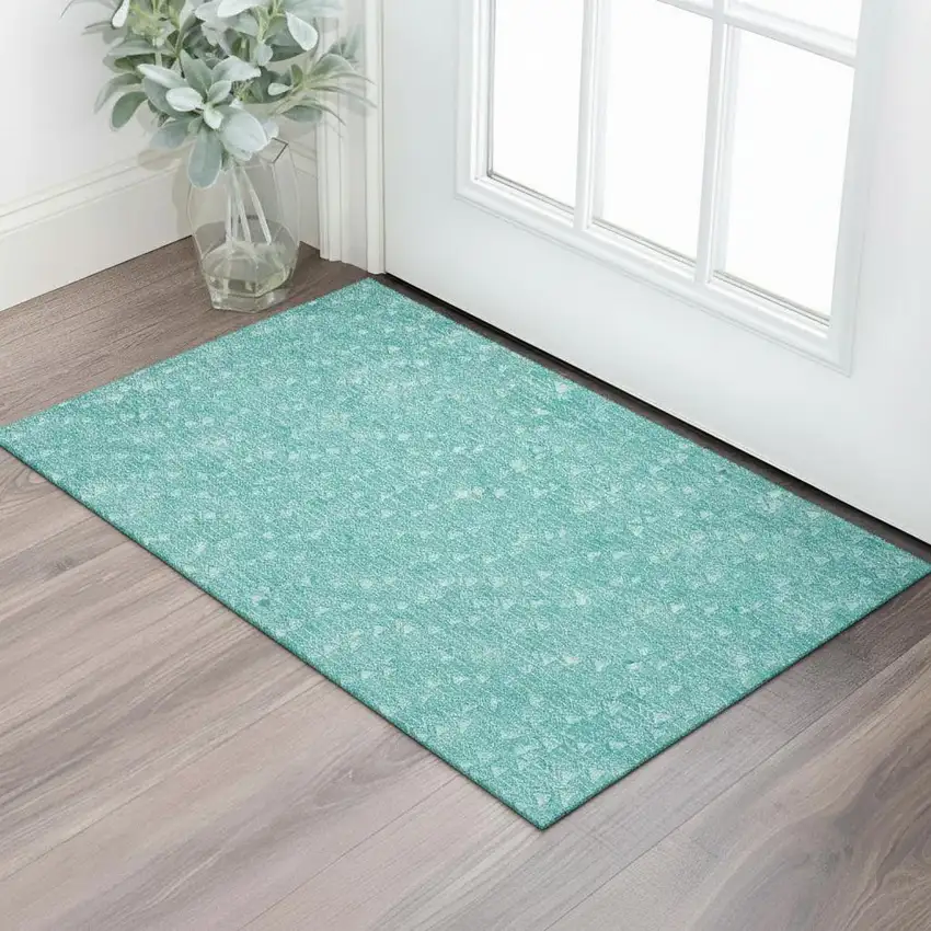 Teal And Ivory Geometric Washable Area Rug With UV Protection Photo 1
