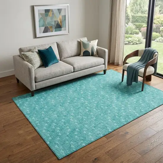 Teal And Ivory Geometric Washable Area Rug With UV Protection Photo 1
