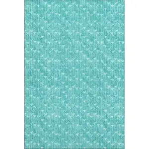 Photo of Teal And Ivory Geometric Washable Area Rug With UV Protection