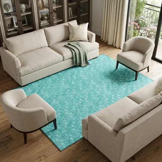 Teal And Ivory Geometric Washable Area Rug With UV Protection Photo 1