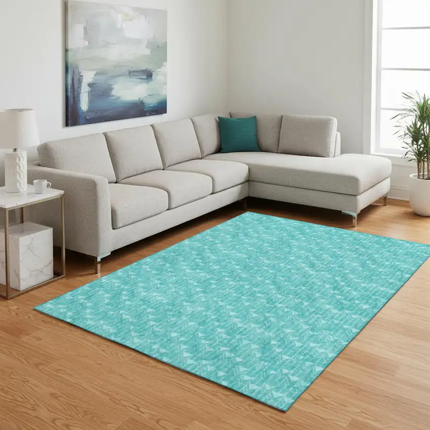 Teal And Ivory Geometric Washable Area Rug With UV Protection Photo 1