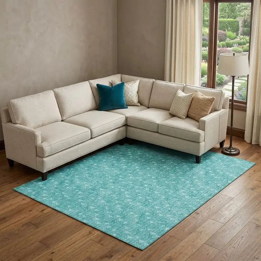 Teal And Ivory Geometric Washable Area Rug With UV Protection Photo 1