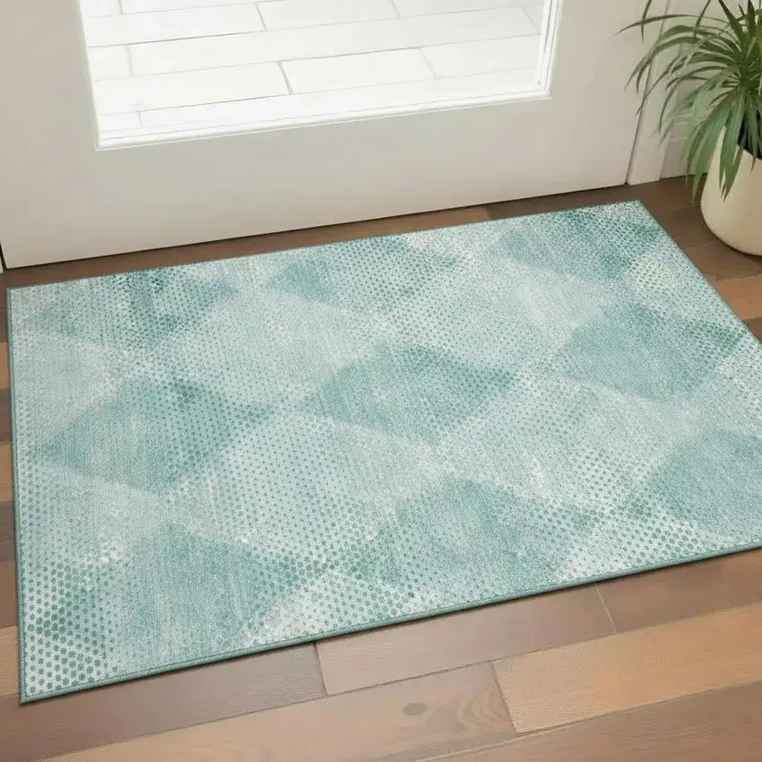 Teal And Ivory Geometric Washable Area Rug With UV Protection Photo 1