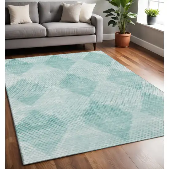 Teal And Ivory Geometric Washable Area Rug With UV Protection Photo 2