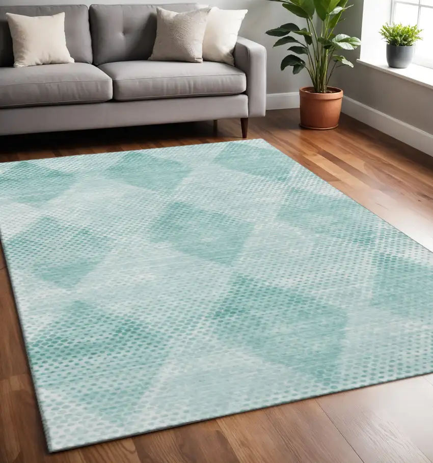 Teal And Ivory Geometric Washable Area Rug With UV Protection Photo 2