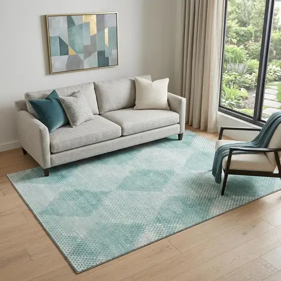 Teal And Ivory Geometric Washable Area Rug With UV Protection Photo 1