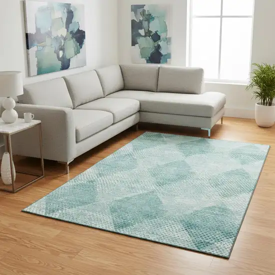 Teal And Ivory Geometric Washable Area Rug With UV Protection Photo 1