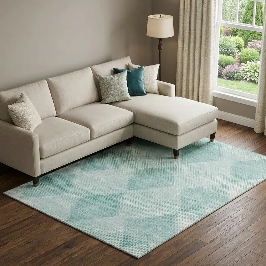 Teal And Ivory Geometric Washable Area Rug With UV Protection Photo 1