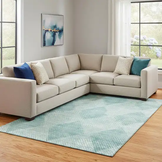 Teal And Ivory Geometric Washable Area Rug With UV Protection Photo 1