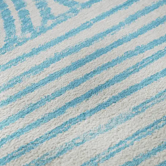 Teal And Ivory Geometric Washable Area Rug With UV Protection Photo 9