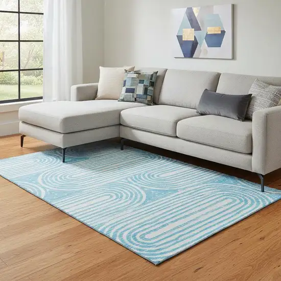 Teal And Ivory Geometric Washable Area Rug With UV Protection Photo 1