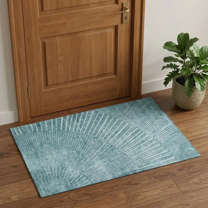 Teal And Ivory Geometric Washable Area Rug With UV Protection Photo 1