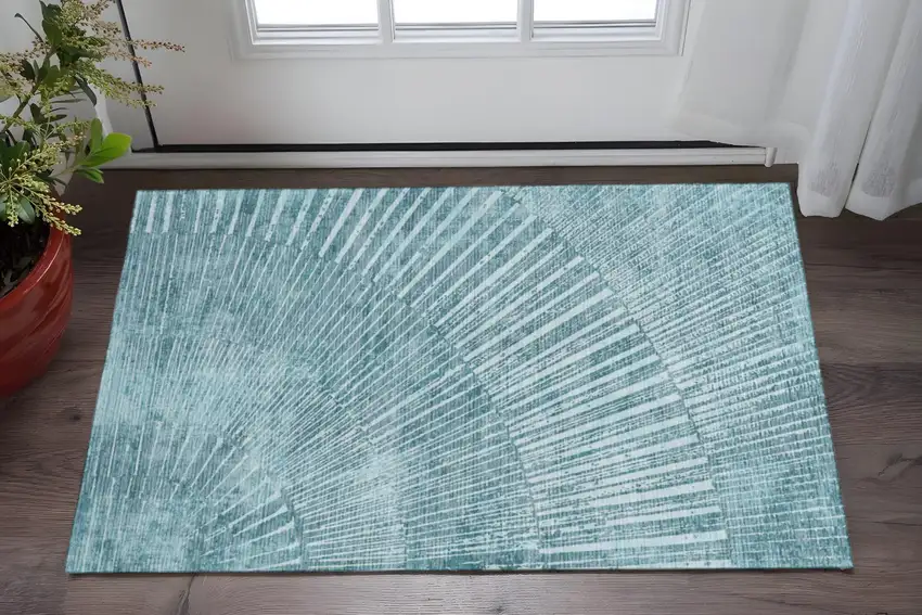 Teal And Ivory Geometric Washable Area Rug With UV Protection Photo 2