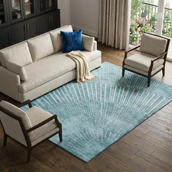 Teal And Ivory Geometric Washable Area Rug With UV Protection Photo 1