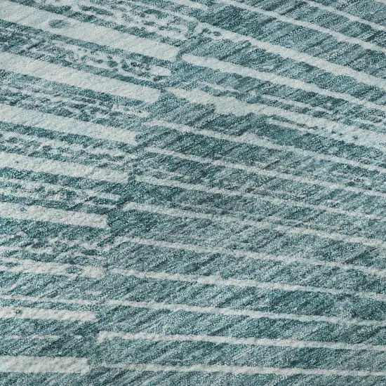 Teal And Ivory Geometric Washable Area Rug With UV Protection Photo 9