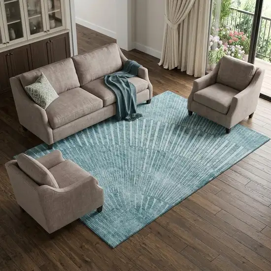 Teal And Ivory Geometric Washable Area Rug With UV Protection Photo 1