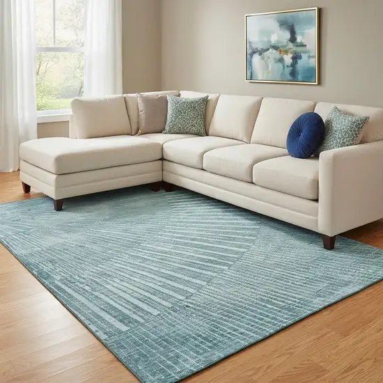 Teal And Ivory Geometric Washable Area Rug With UV Protection Photo 1
