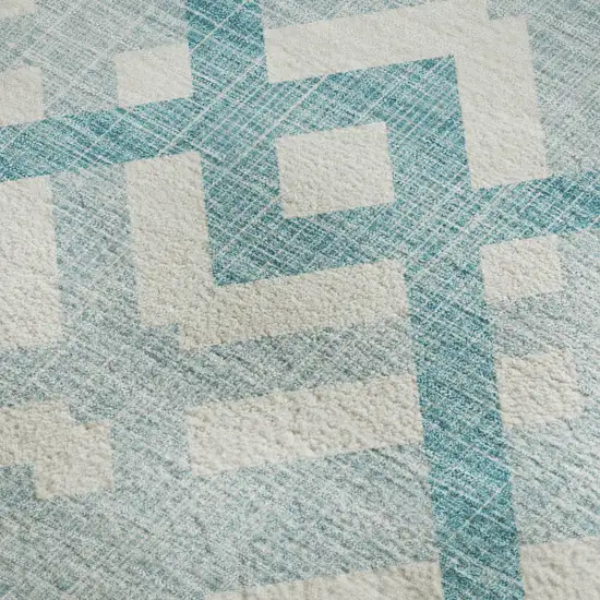Teal And Ivory Geometric Washable Area Rug With UV Protection Photo 2