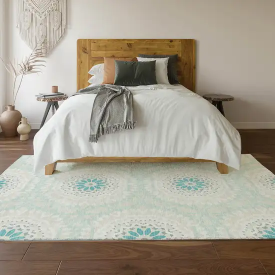 Teal And Ivory Geometric Washable Area Rug With UV Protection Photo 5