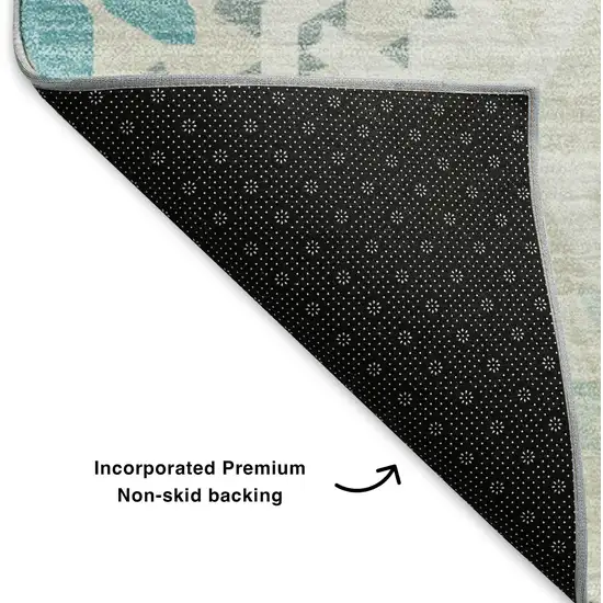 Teal And Ivory Geometric Washable Area Rug With UV Protection Photo 6