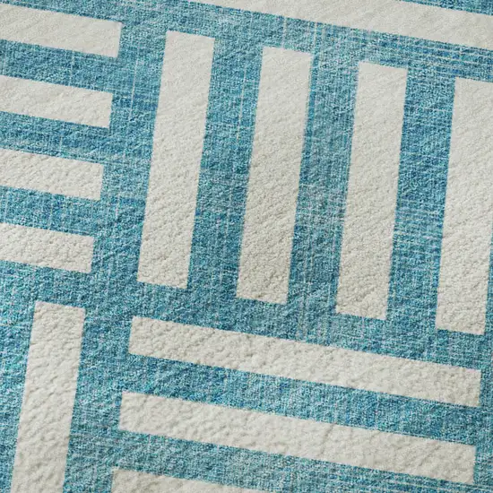 Teal And Ivory Geometric Washable Area Rug With UV Protection Photo 1