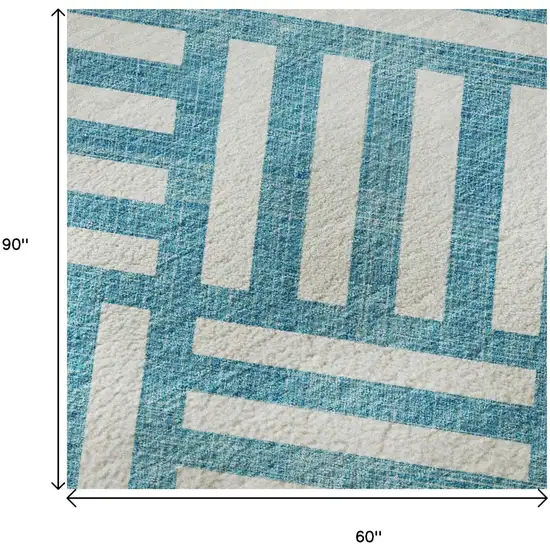Teal And Ivory Geometric Washable Area Rug With UV Protection Photo 9