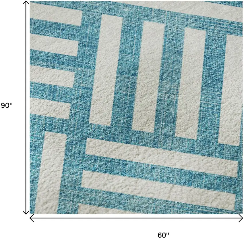 Teal And Ivory Geometric Washable Area Rug With UV Protection Photo 9